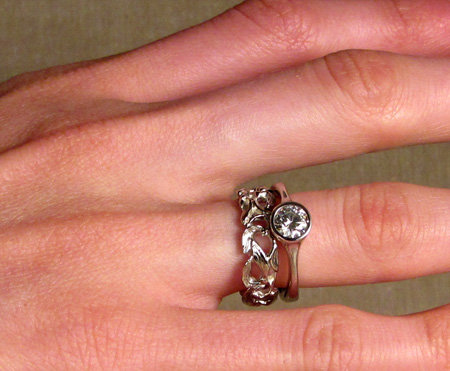 Low-profile solitaire engagement ring in palladium