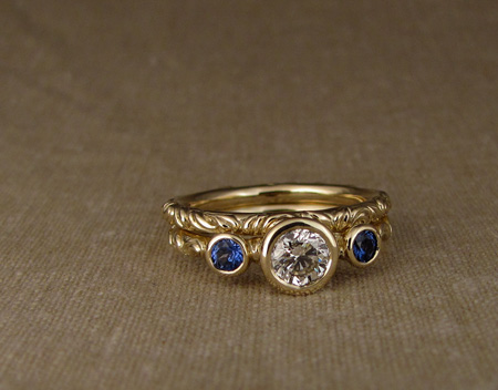 Victorian solitaire with diamond and sapphires