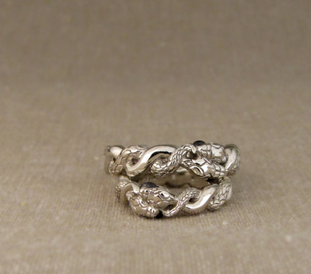 Entwined snake rings with star sapphires - 14K