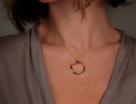 Hand-carved ouroboros pendant in 14K