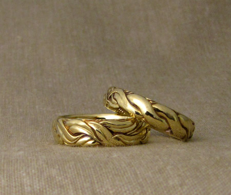 Hand-carved art nouveau leaves to rope wedding bands, 18K