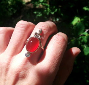 Hand-carved snake cocktail ring with Carnelian and OEC diamond, 14K gold