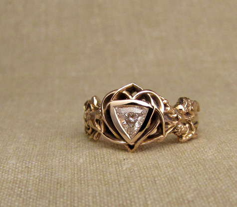 Easter wedding ring, handmade in 14K rose gold with a trillion diamond