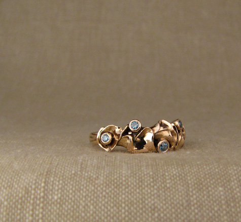 Custom calla lily band in rose gold + diamonds