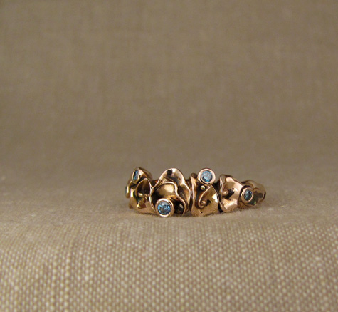 Custom calla lily band in rose gold + diamonds