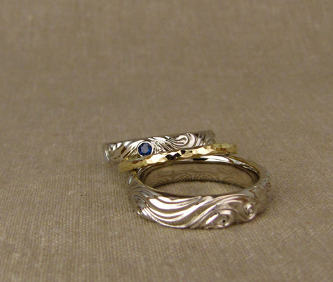 Custom water swirl wedding bands