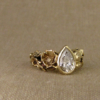 floral solitaire with a pear diamond