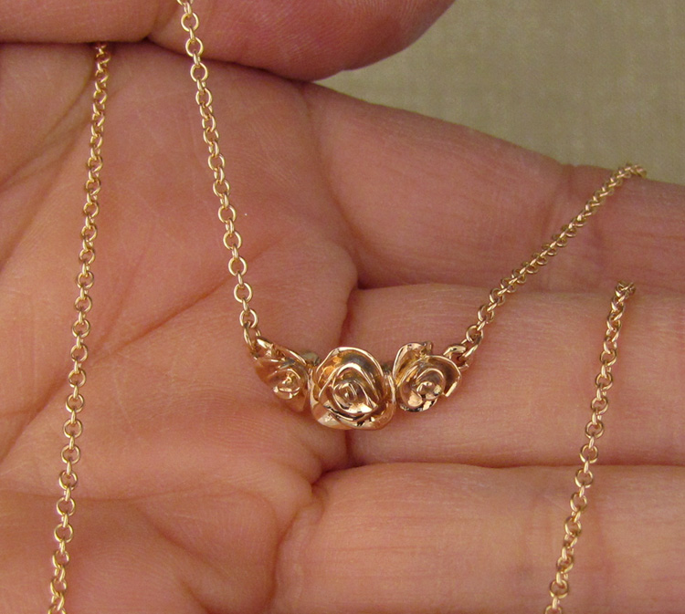Hand-carved rose choker in rose gold
