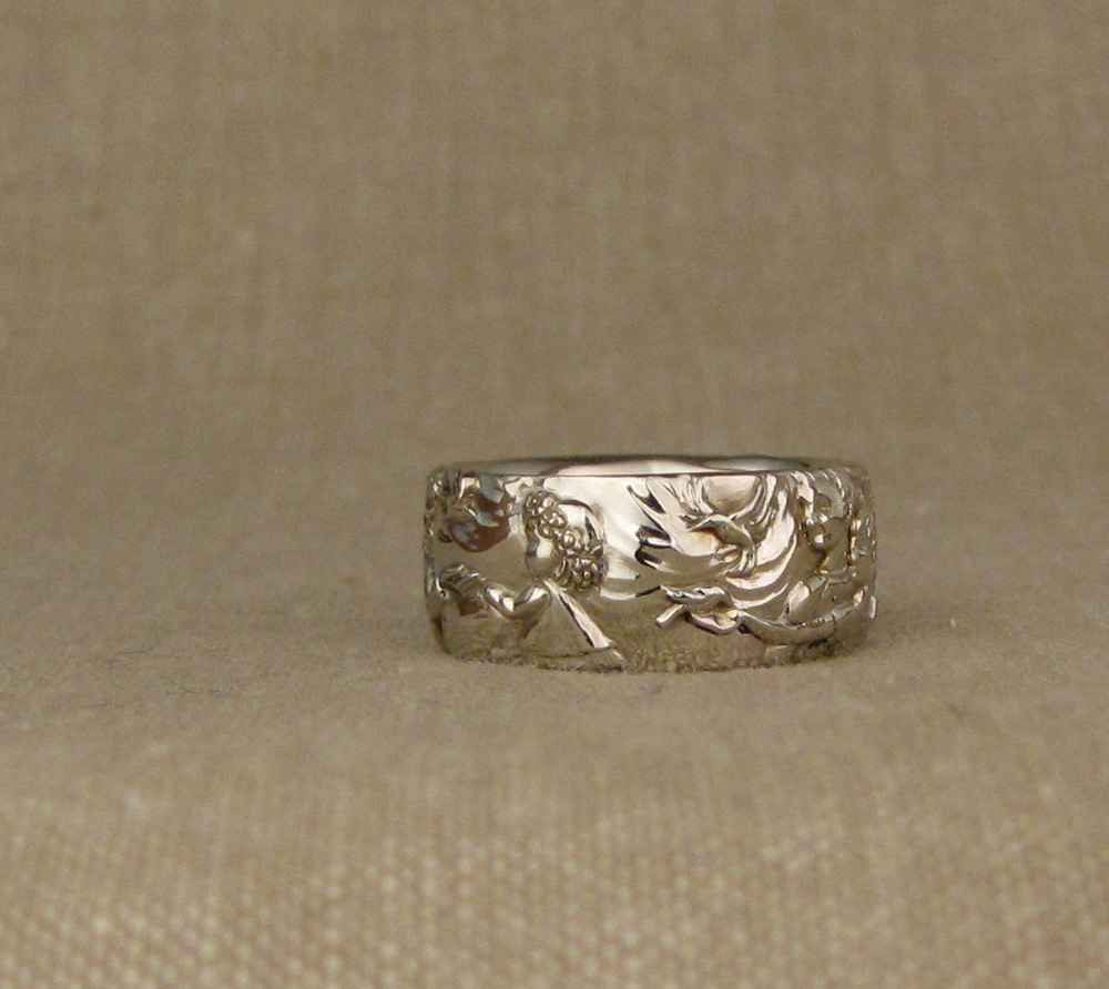 Hand-carved family portrait storybook band, 14K white gold