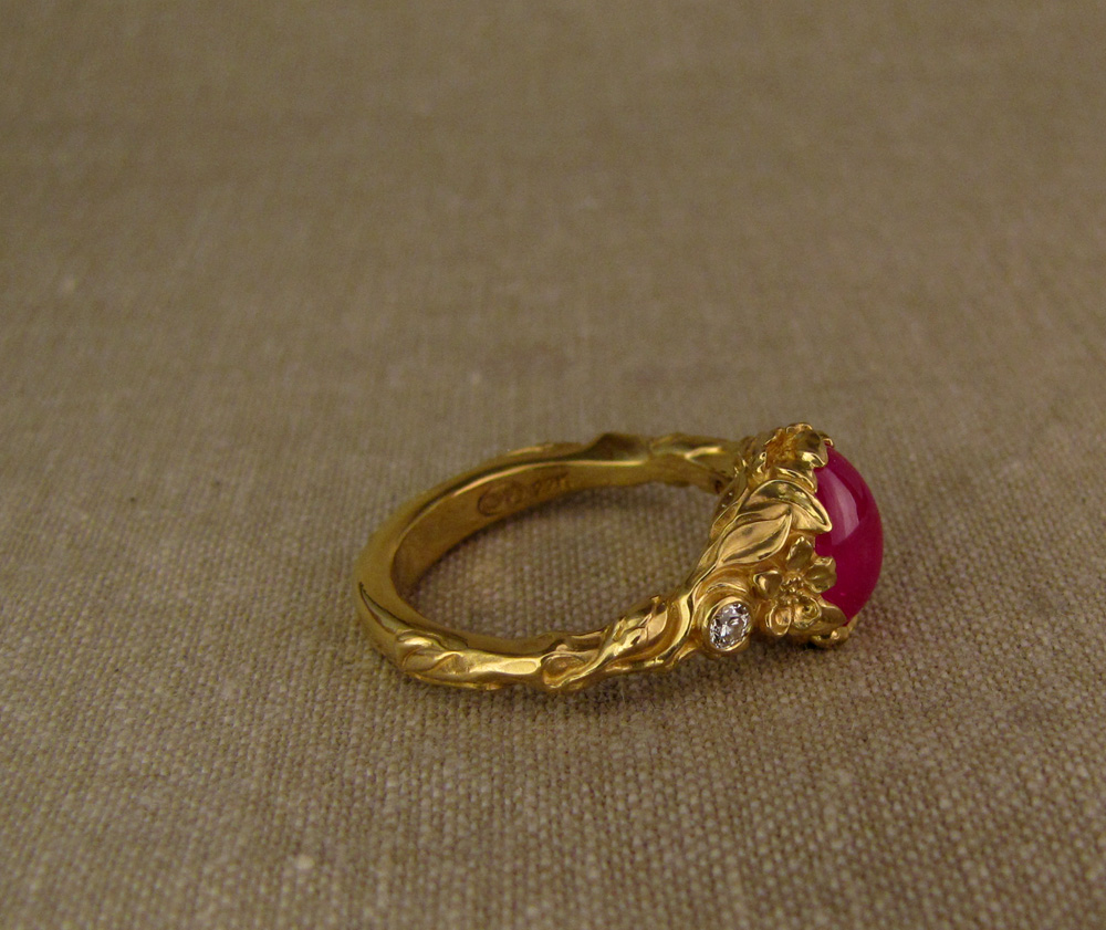 Custom designed & hand-carved Japanese Peach Blossom solitaire with cabochon ruby and diamonds, 22K gold