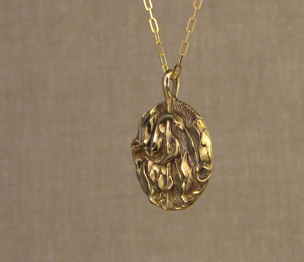 Custom hand-carved Asclepius & Magnolia blooms pendant in 18K