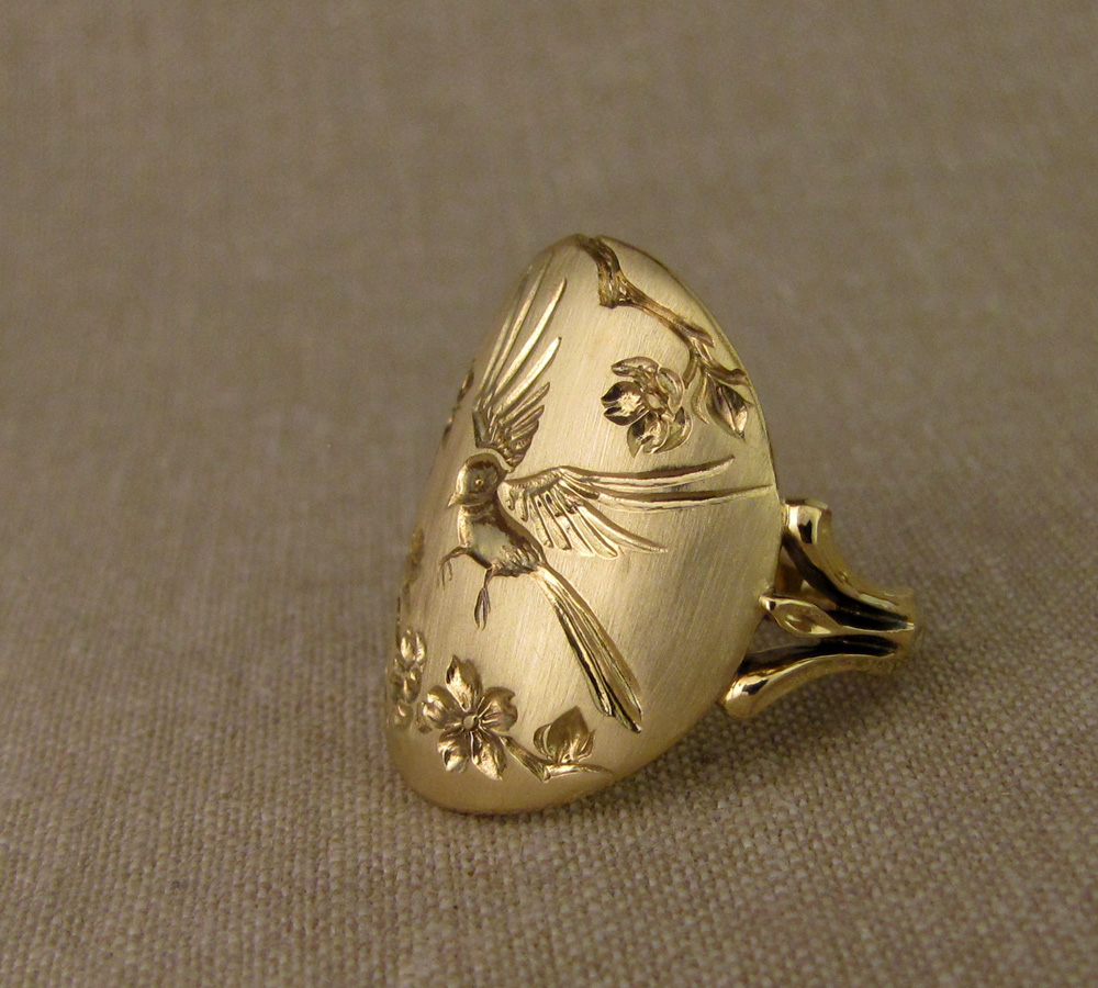 Custom designed & carved ring by Cheyenne Weil, 18K yellow gold