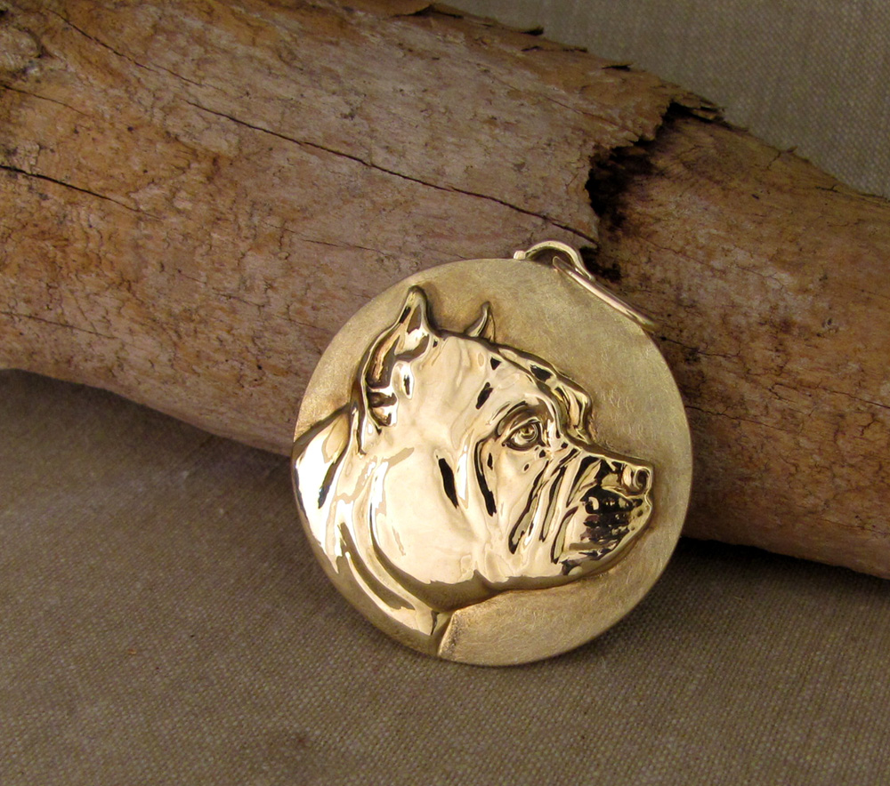 Custom designed & hand-carved bulldog pet portrait pendant. 14K gold.
