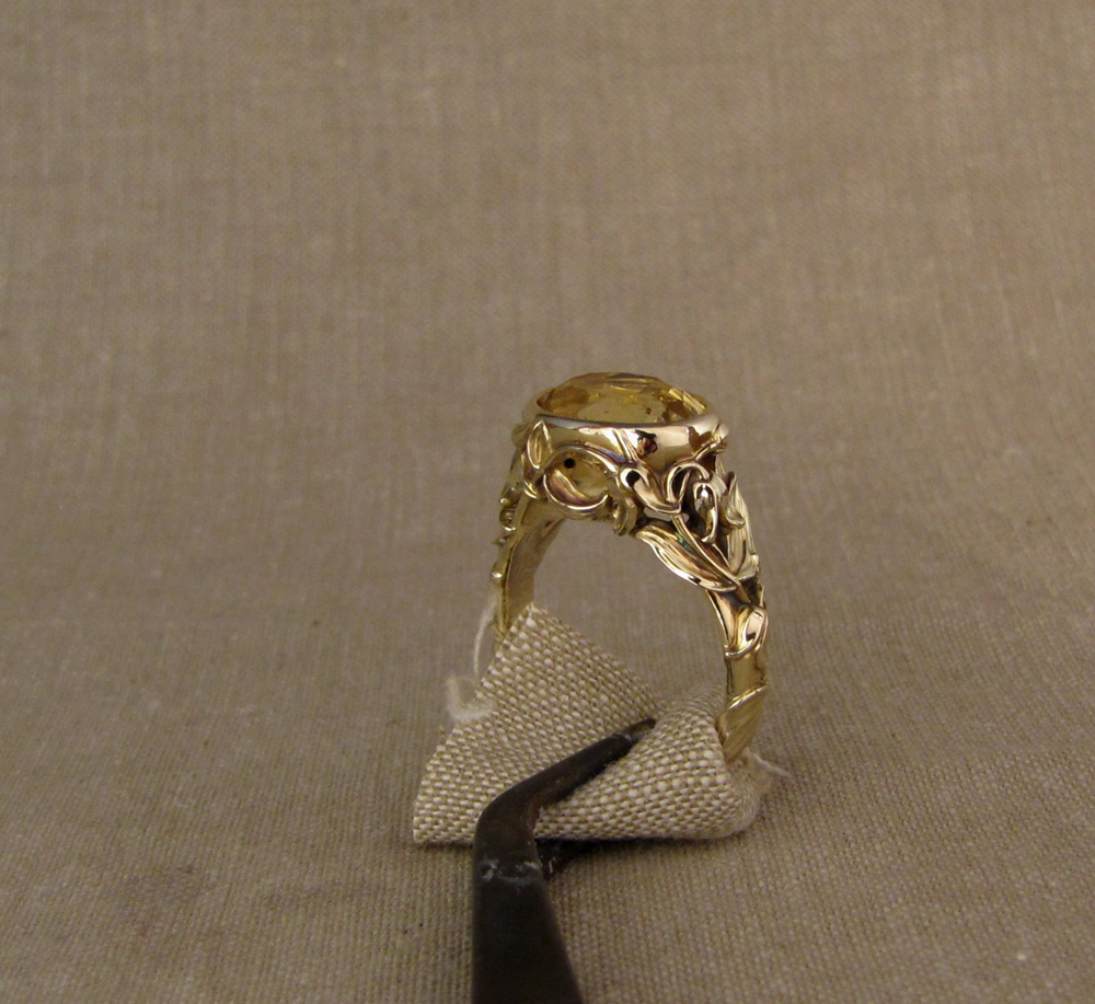 Custom designed & hand-carved citrine solitaire with clematic flower motif, 14K yellow gold