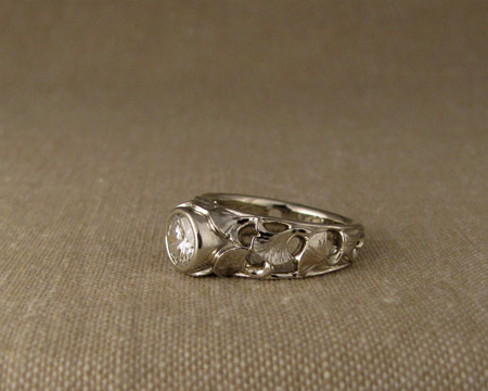 Carved ginkgo leaf and diamond solitaire, 18K white gold