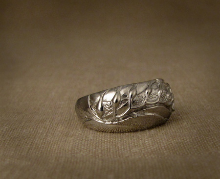 Hand-carved giant kelp ring; 14K white gold