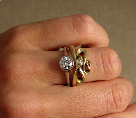 18K snake ring with diamond solitaire
