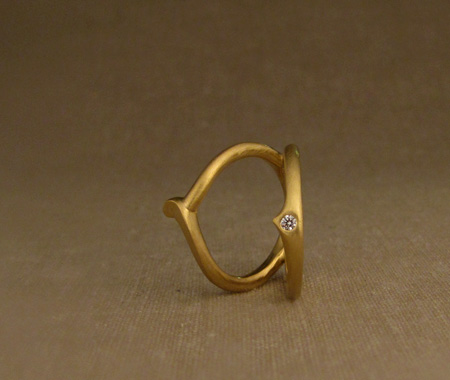 hand-carved split-ring in 22K with 2mm diamond