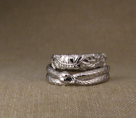 Hand-carved ouroboros + Pacific NW wedding bands, platinum
