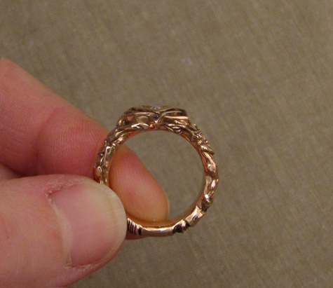 Easter wedding ring, handmade in 14K rose gold with a trillion diamond