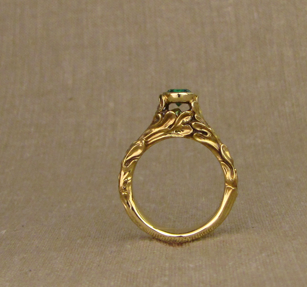 Hand-carved Rococo Leaves Emerald Solitaire in 18K gold