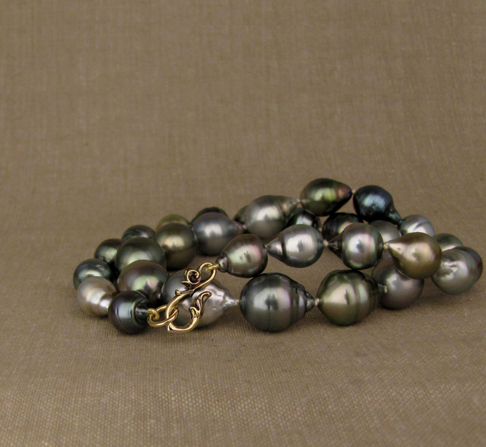 Baroque Tahitian pearls with hand-carved custom hook clasp, 14K gold