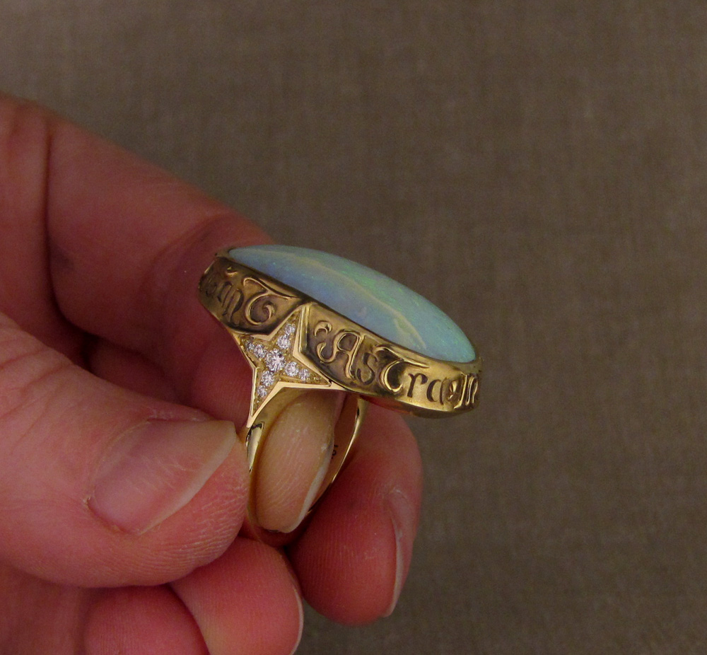 Custom designed & hand-carved Boulder Opal Ring, Latin inscription, 18K, opal, diamonds