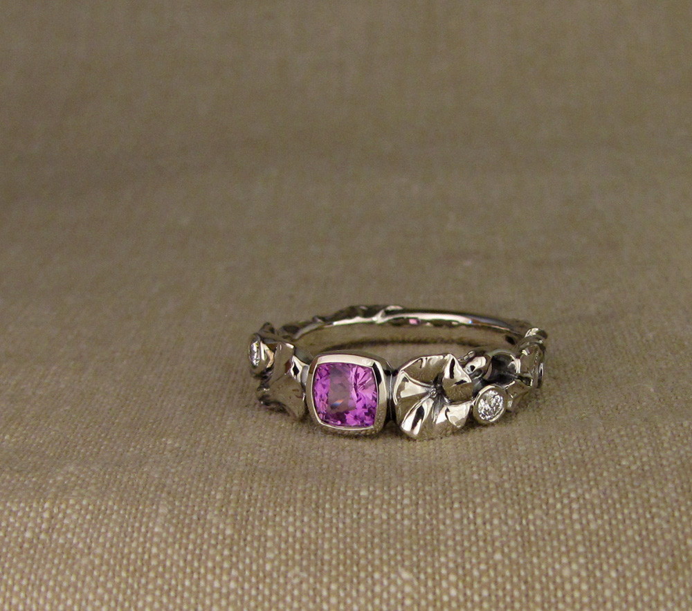 Custom hand-carved Morning Glory Solitaire with Purple Cushion Sapphire and Diamonds, 14K white gold