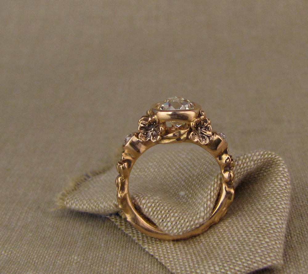 Custom designed & hand-carved Peach Blossom Solitaire bezel set with 1.39ct antique Old Mine Cut diamond, 19K rose gold.