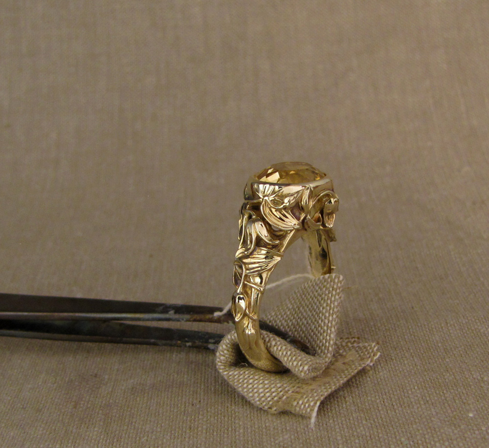 Custom designed & hand-carved citrine solitaire with clematic flower motif, 14K yellow gold