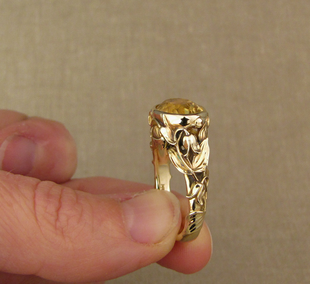 Custom designed & hand-carved citrine solitaire with clematic flower motif, 14K yellow gold