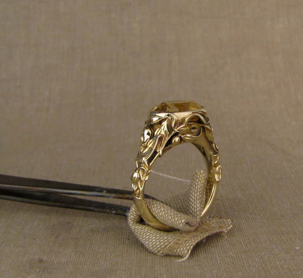 Custom designed & hand-carved citrine solitaire with clematic flower motif, 14K yellow gold