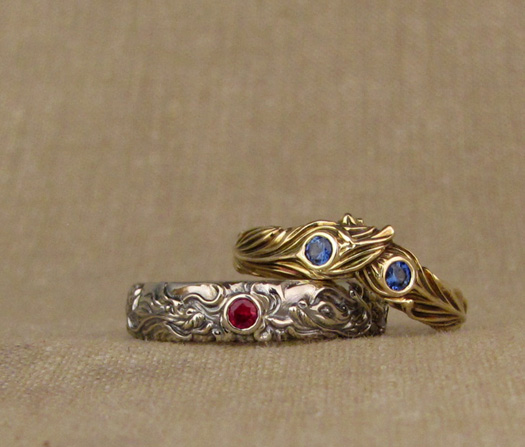 Custom designed & hand carved Chinese Dragon & Phoenix Feather wedding bands, 14K white and yellow gold, ruby & blue sapphires.
