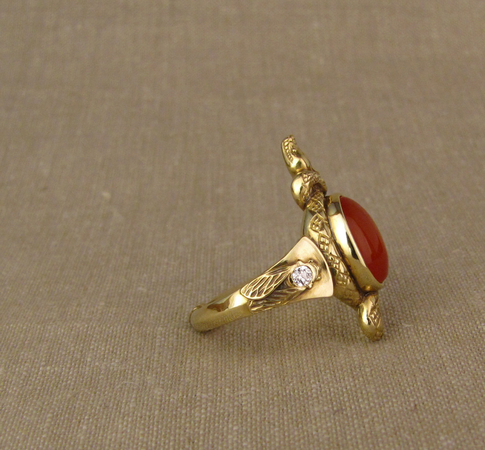 Custom designed & hand-carved Snake ring set with carnelian and antique Old European cut diamonds; cicada & Pleiades motifs on shoulders, dogwood blossom on the base. 