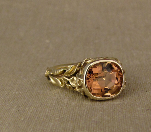 Custom designed & hand-carved Peach Tourmaline Solitaire with Sweet Peas motif, 14K gold