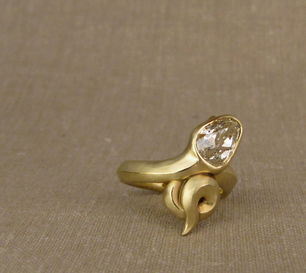Custom designed & hand-carved Snake Ring set with a 2ct antique pear diamond, 18K gold