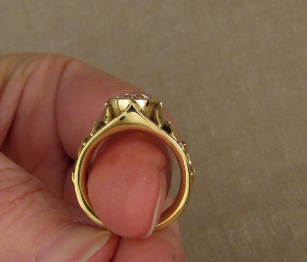 Custom designed & hand-carved Ginkgo Leaf Solitaire in 18K yellow gold with 1.5ct diamond and small yellow diamond in base