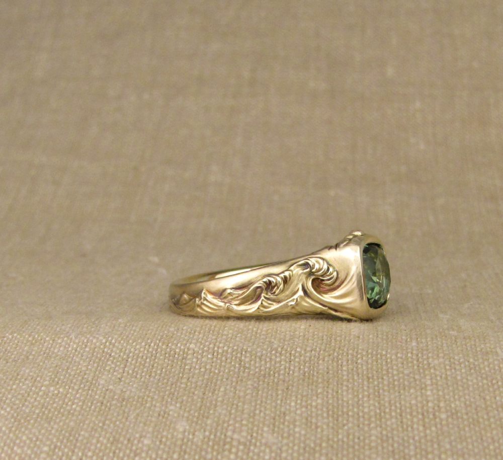 Hand-carved Hokusai-inspired Great Wave solitaire with blue-green tourmaline, 14K yellow gold