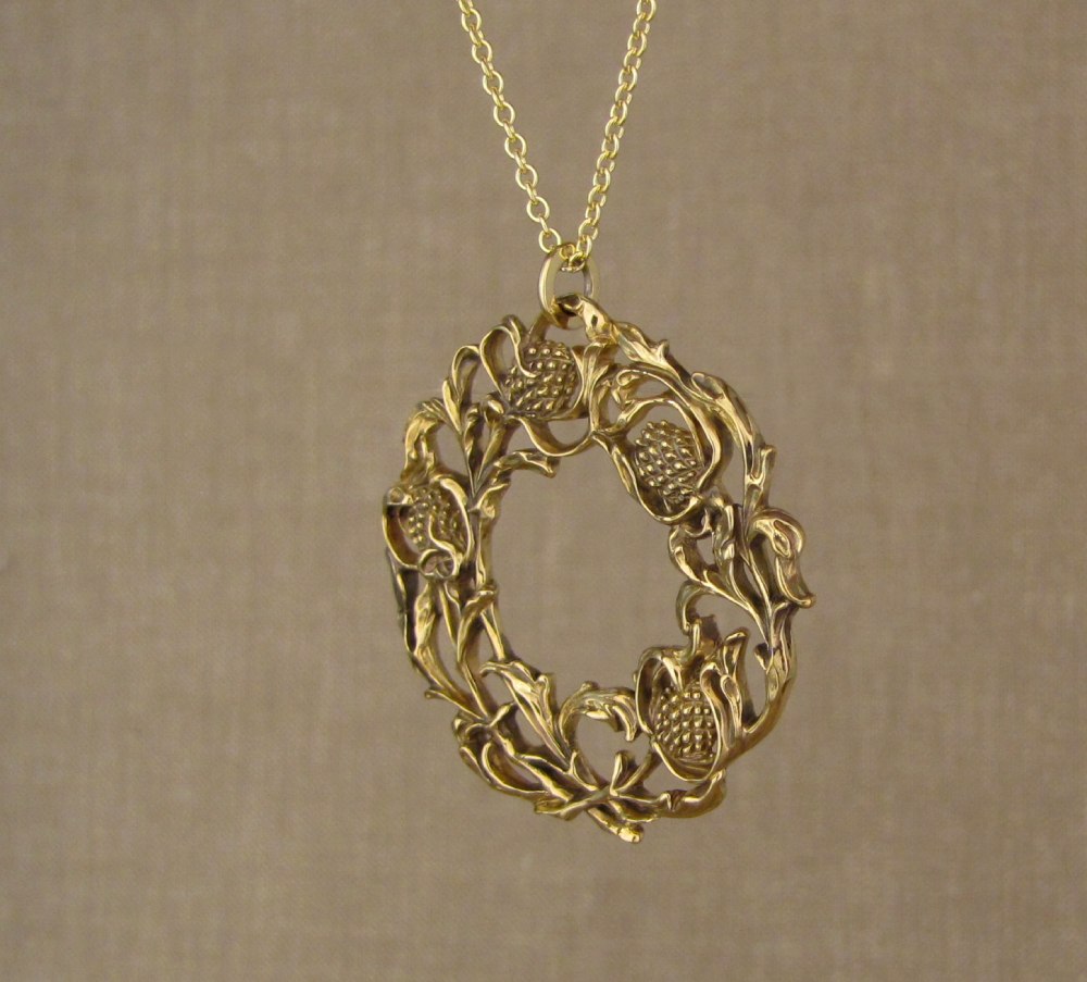 Hand-carved Sea Holly Pendant in 18K yellow gold