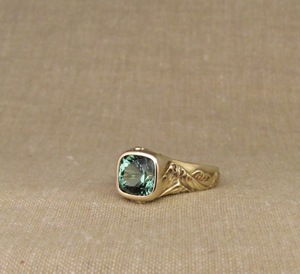 Hand-carved Hokusai-inspired Great Wave solitaire with blue-green tourmaline, 14K yellow gold
