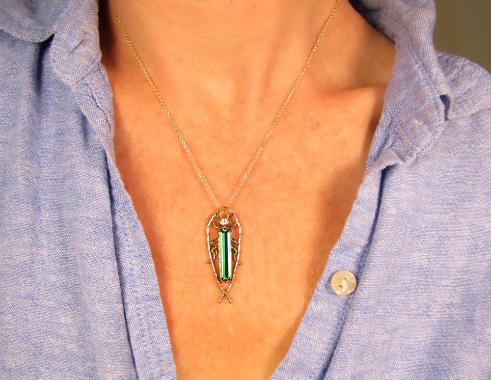Hand-carved Fantastic Jeweled Insect pendant with elongated bluish-green tourmaline and diamond in 18K yellow gold