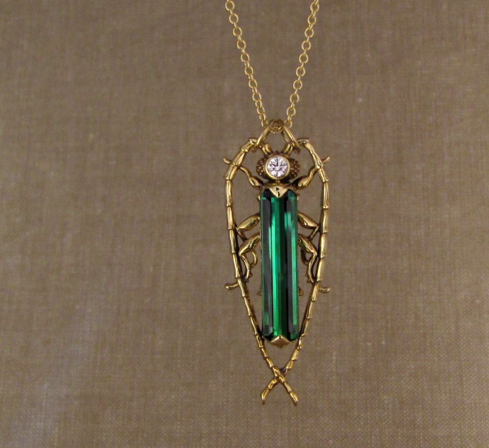 Hand-carved Fantastic Jeweled Insect pendant with elongated bluish-green tourmaline and diamond in 18K yellow gold