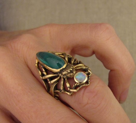 Custom designed, hand carved Spider Ring in 18K yellow gold, cabohon pear emerald and Australian opal