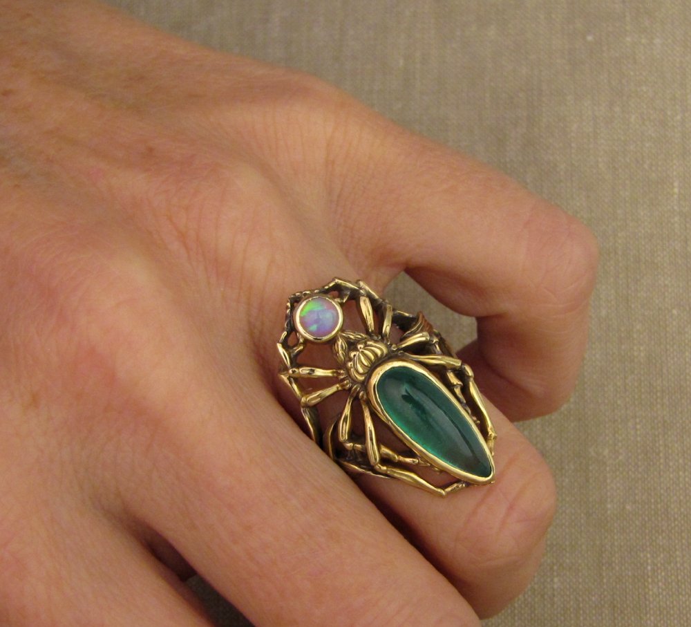 Custom designed, hand carved Spider Ring in 18K yellow gold, cabohon pear emerald and Australian opal
