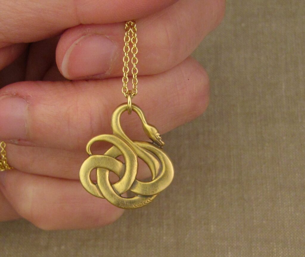 Curling Snake pendant, 18K gold, cheyenne weil jewelry