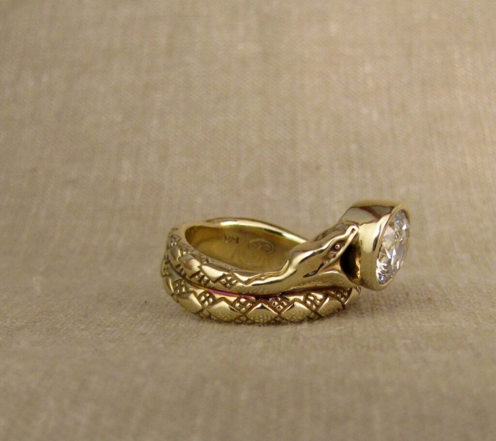 Amphisbaena - Double-headed snake solitaire ring with 1.5ct diamond, 14K gold. cheyenne weil jewelry