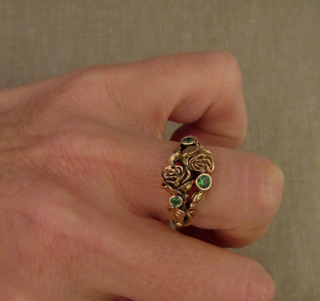 Pair of Roses ring in 19K rose gold, set with tsavorite garnets, cheyenne weil jewelry