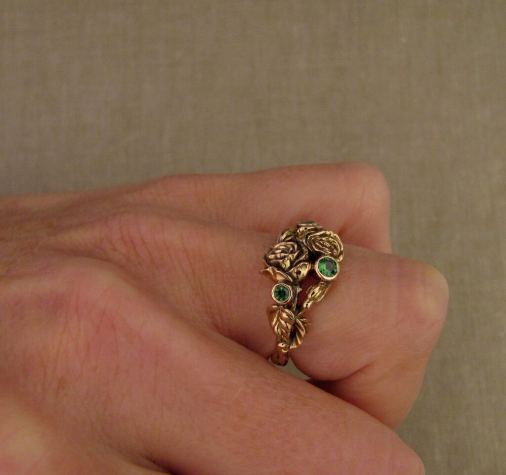 Pair of Roses ring in 19K rose gold, set with tsavorite garnets, cheyenne weil jewelry