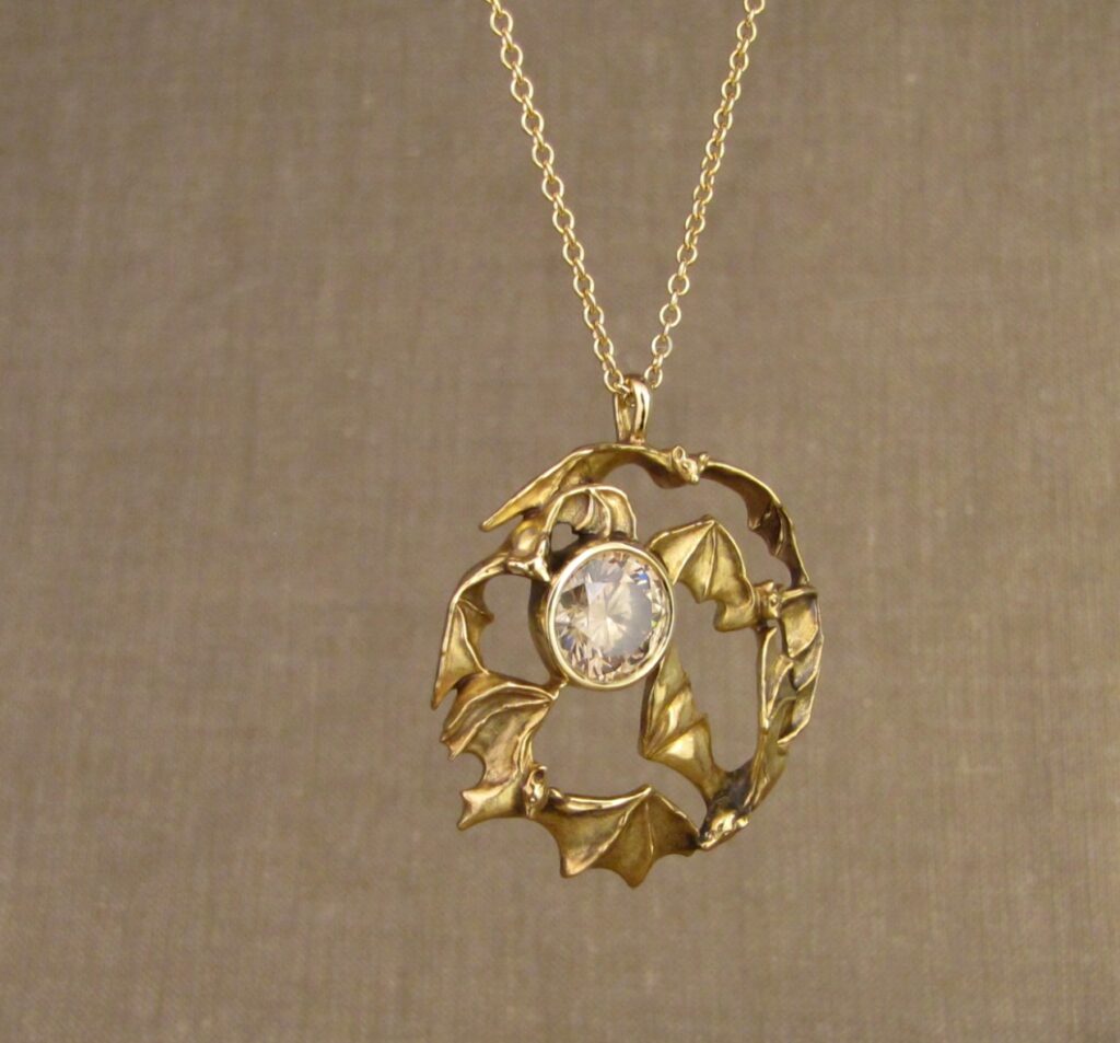 Swirling Bats pendant in 18K gold, set with 2 1/4ct smoky-champagne diamond, cheyenne weil jewelry