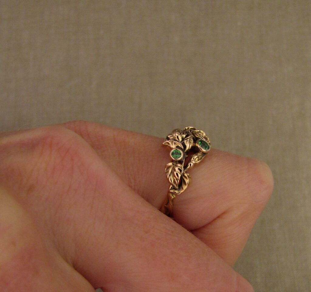 Pair of Roses ring in 19K rose gold, set with tsavorite garnets, cheyenne weil jewelry